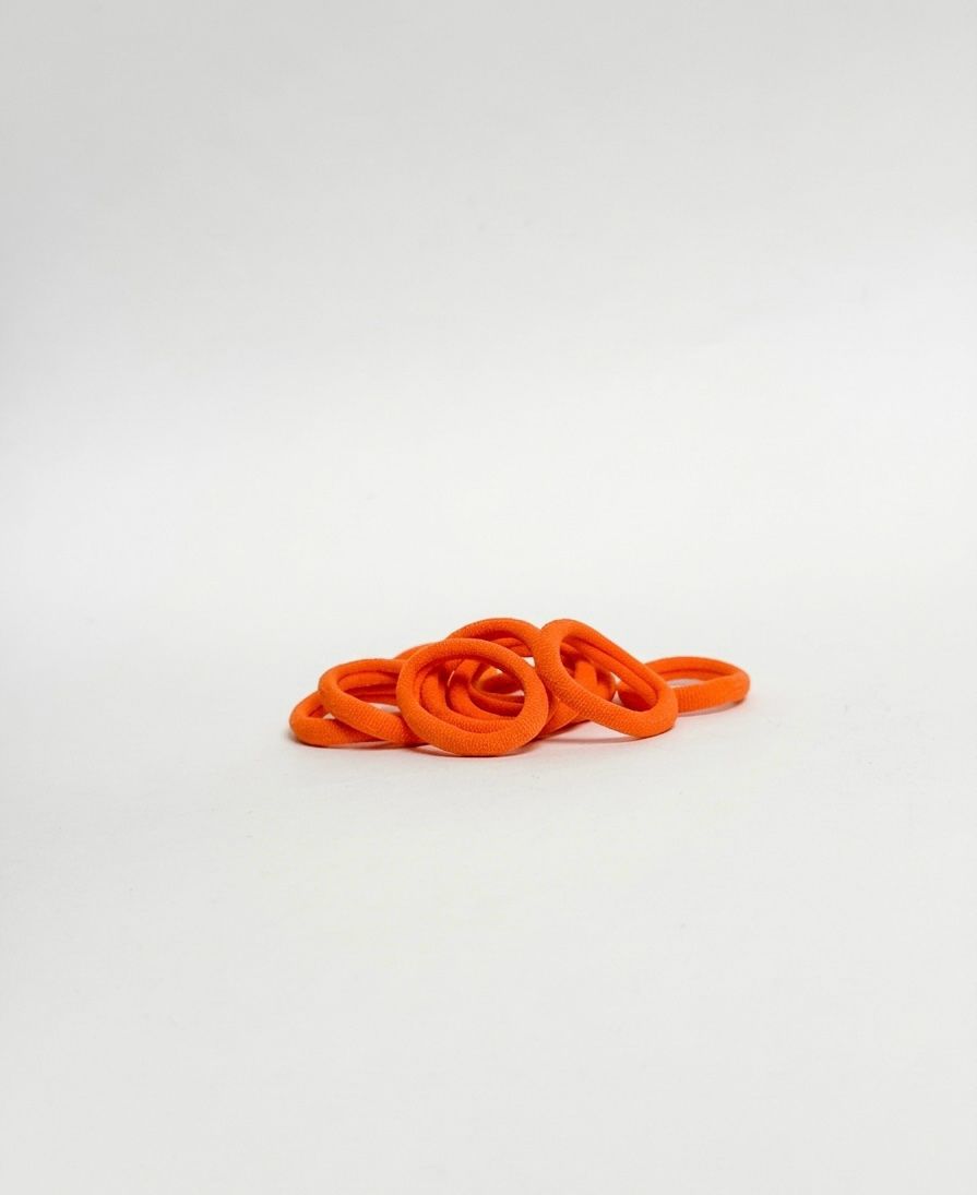 Kleine oranje elastiekjes 10 atuks